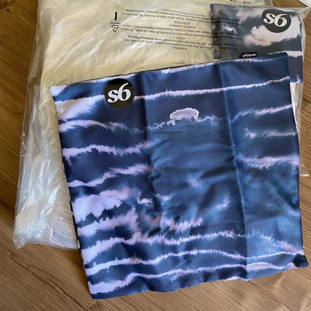 Two Society6 pillowcases and throw inserts